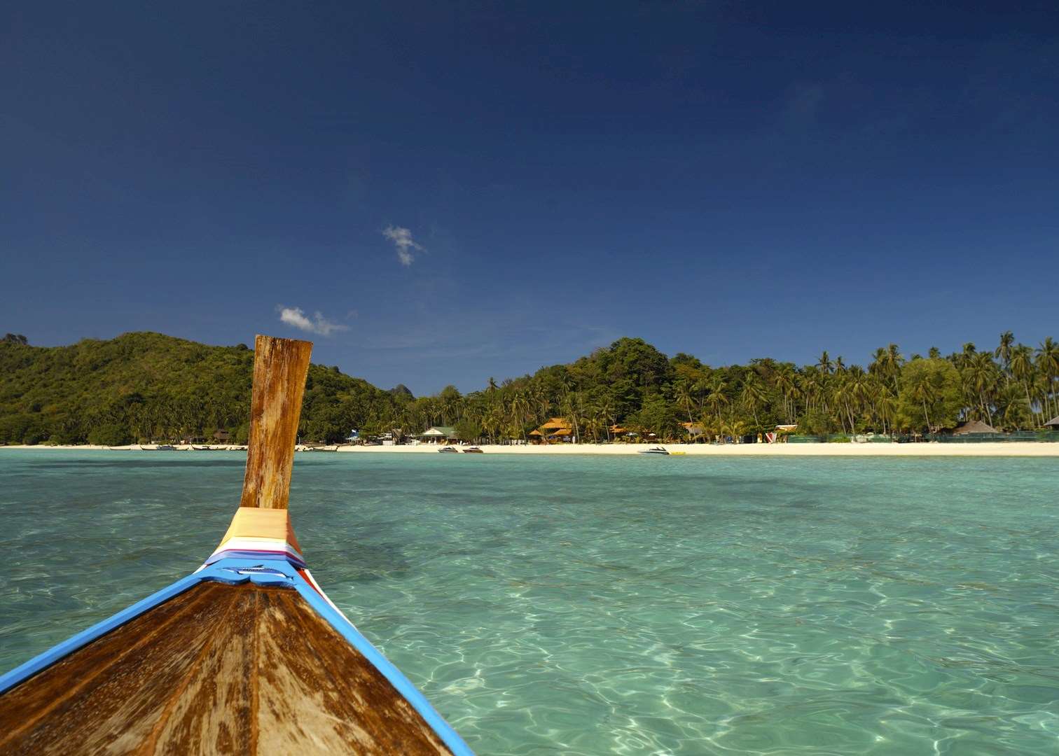 Taking a longtail boat ride in southern Thailand is highly recommended
