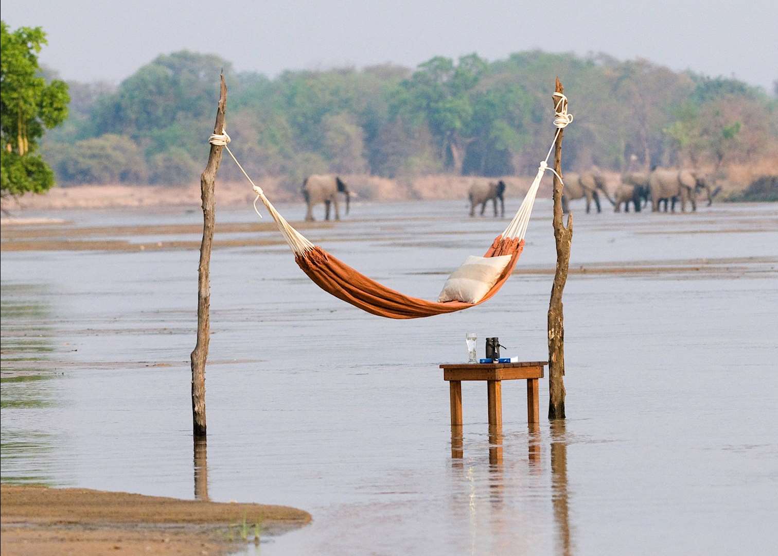 Relaxing in the Kapamba River by the Bushcamp Company
