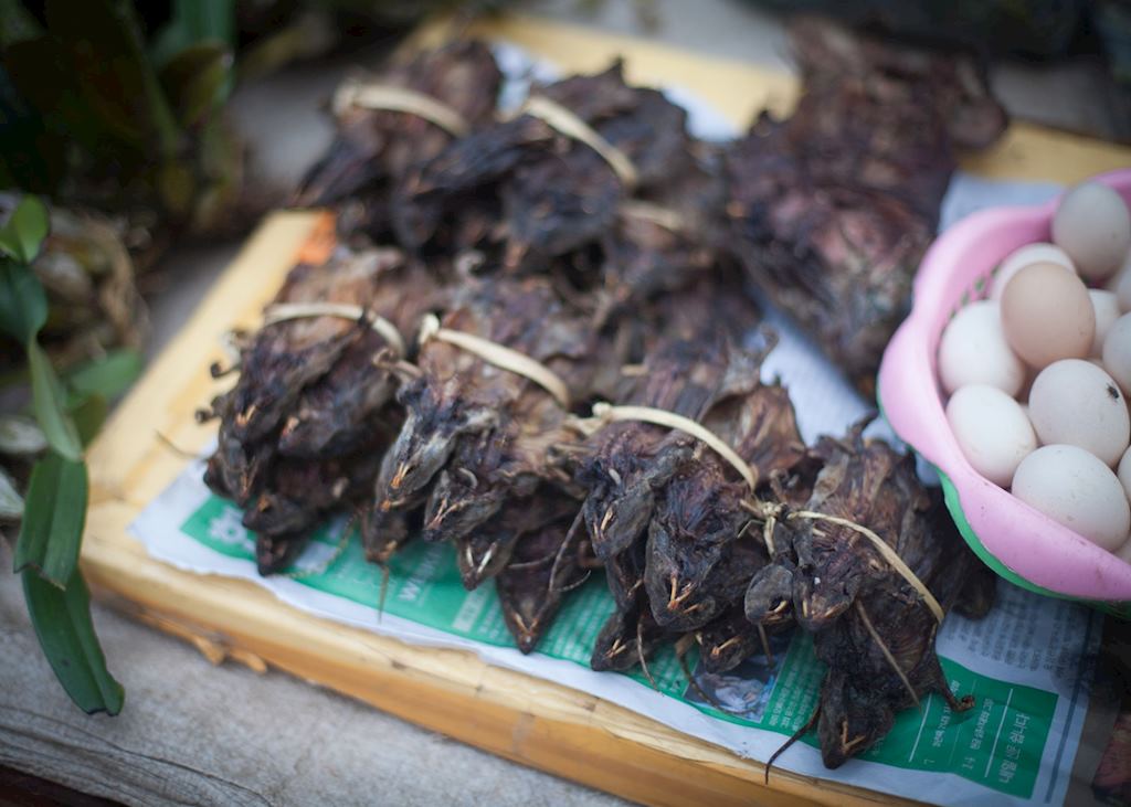 Barbecued mice for sale at a local food market in Luang Prabang, Laos 
