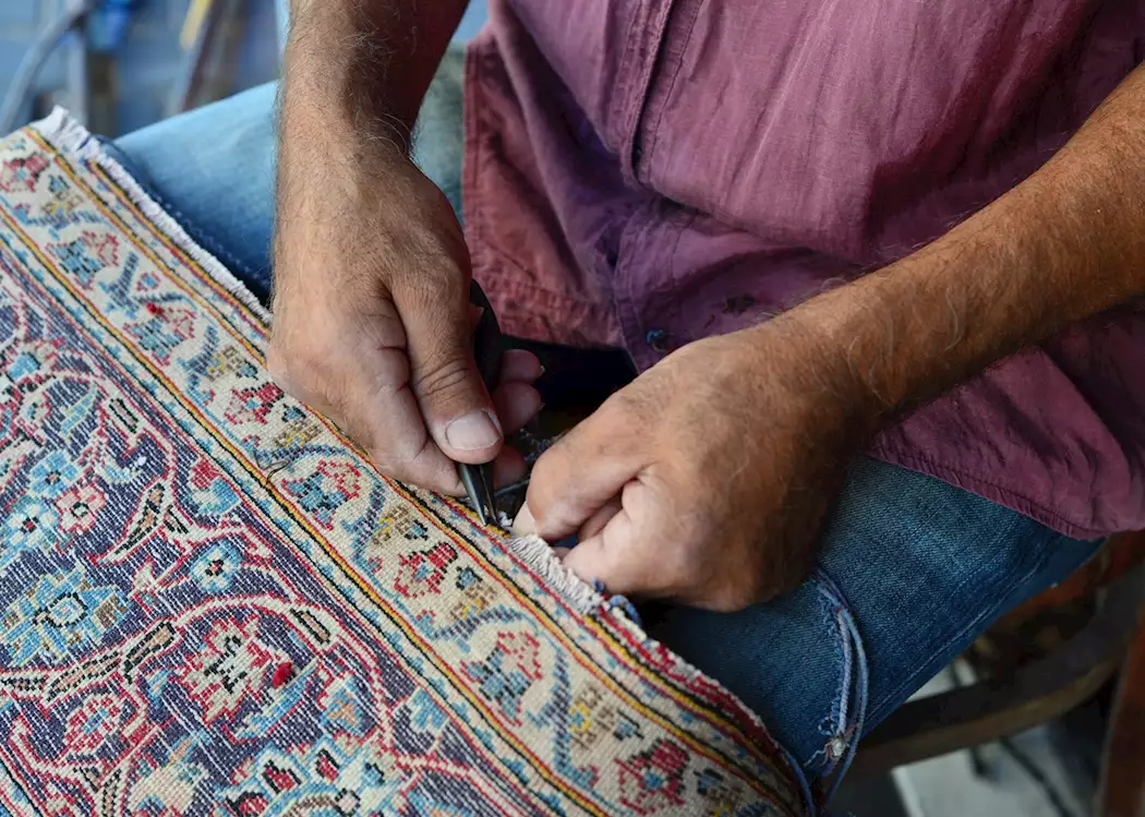 Carpet repair at a flea market, Jaffa