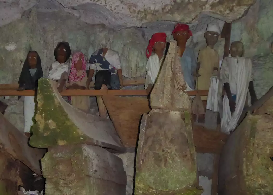 Tau-taus inside the cave of Tampangallo