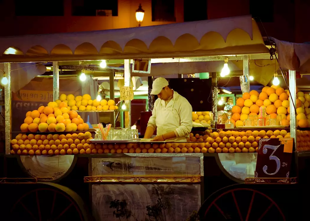 Orange seller in Marrakesh, Morocco