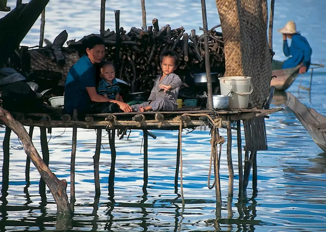 Local family resting in their house on Tonle Sap Lake, Siem Reap