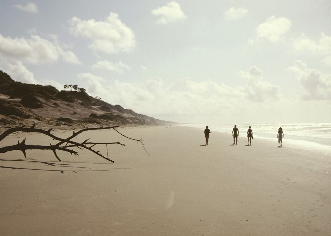 Walking along the beach at sunrise, Tana River Delta