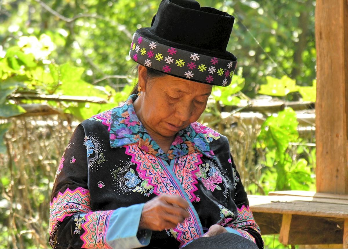 Hmong lady sewing, northern Thailand