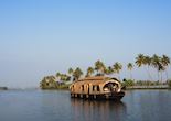 A Kerala houseboat cruising along the backwaters
