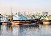 Traditional wooden dhows in Dubai Port
