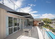 Balcony overlooking pool