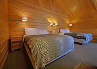 Premier cabin bedroom, Sheep Mountain Lodge, Alaska