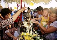 Celebrating Songkran, the Thai New Year Festival, Thailand Celebrating Songkran, the Thai New Year Festival, Thailand