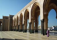 Woman outside the Hassan II mosque. Casablanca, Morocco Woman outside the Hassan II mosque. Casablanca, Morocco