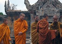 Buddhist monks outside the central sanctuary at Preah Vihear Buddhist monks outside the central sanctuary at Preah Vihear