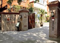 Red Wall Garden Hotel Entrance Red Wall Garden Hotel Entrance