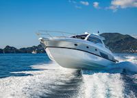 Boat speeding across wake, French Riviera Boat speeding across wake, French Riviera