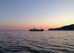 MY Drenec at sunset