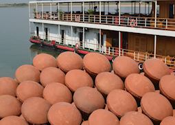 Terracotta pots near Yandabo, with the RV Pandaw behind