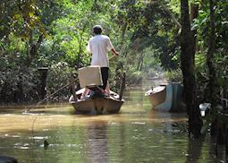 Boatman in the Mekong Delta