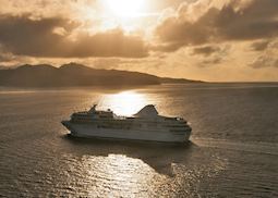 Paul Gauguin Cruise Ship at sunset, Tahiti