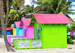Brightly coloured beach huts