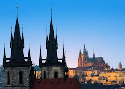 Týn Church and Prague Castle at sunset