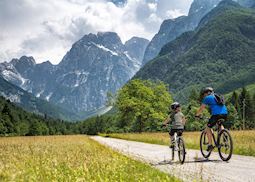 Father and son on a cycling trip in the Alps