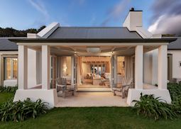 Cottage suite outdoor sitting area at Wharekauhau Country Estate