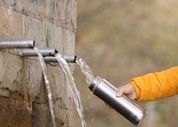 Refilling a reusable water bottle