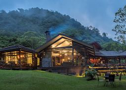 Main building at dusk, El Silencio Lodge