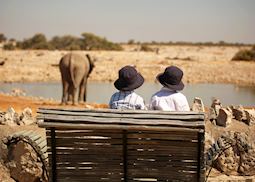 Children at a waterhole in Etosha National Park