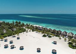 Sun lounging on the beach, Constance Moofushi