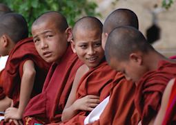 Novice monks chat between lectures in Nyaungshwe