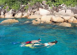 Snorkelling around the rocks at La Reserve