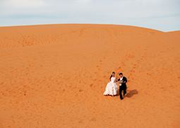 The red sand dunes near Mui Ne are a popular spot for weddings, Vietnam