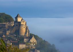 Château de Castelnaud-la-Chapelle in the fog, Dordogne