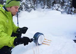 Maple syrup snow candy on snowshoe tour, Banff National Park