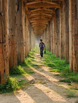 Woman under U Bein Bridge, Mandalay, Burma (Myanmar)