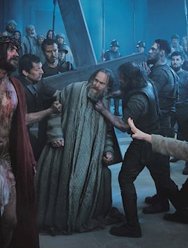 A scene of Jesus and the cross in The Passion Play