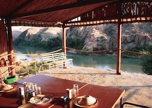 View of the river from the dining room at Kunene Camp, The Skeleton Coast View of the river from the dining room at Kunene Camp, The Skeleton Coast