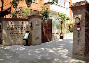 Red Wall Garden Hotel Entrance Red Wall Garden Hotel Entrance