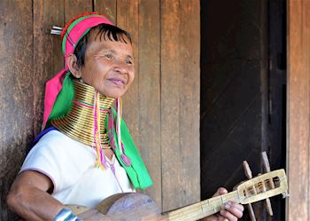 A member of the Kayan Lahwi tribe playing traditional music