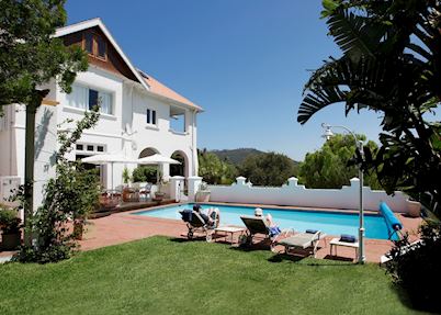 Gardens and pool at Abbey Manor Guesthouse
