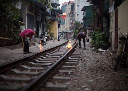 Hanoi locals burning fake money in celebration of Tet