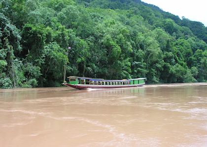 Private boat cruising on the Mekong River