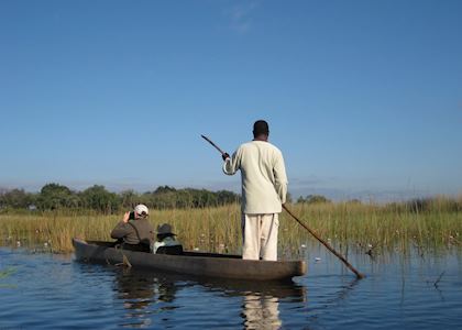 Mokoro ride through the shallow channels, Modumo Concession