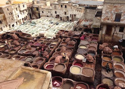Men working in the various stages of the tanneries of Fez