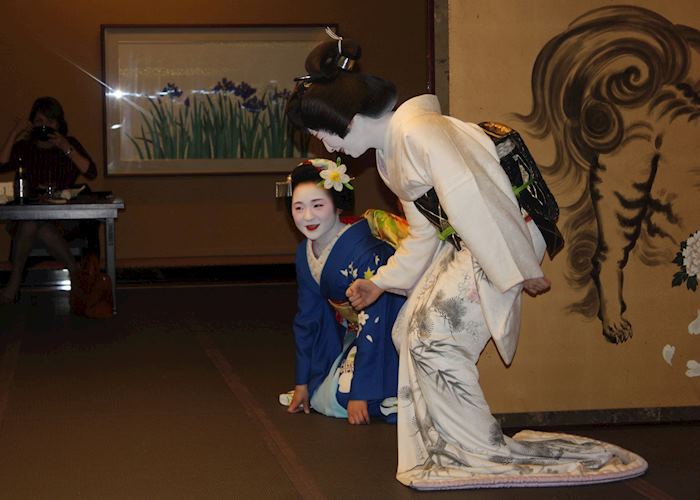 A Maiko and a Geiko during the Geisha Night at the Gion Hatanaka A Maiko and a Geiko during the Geisha Night at the Gion Hatanaka