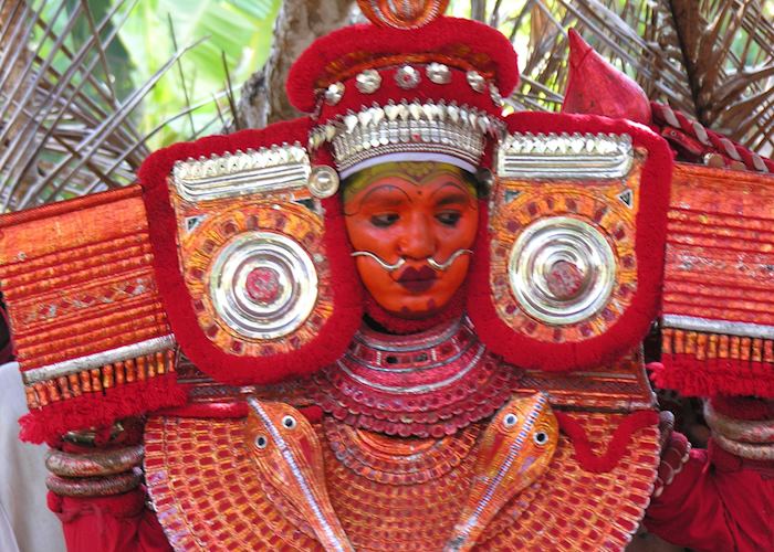 Theyyam dancer