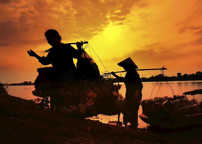 Market sellers at sunset, Hoi An