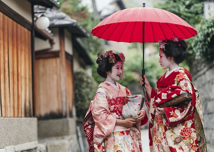 Maiko or apprentice geisha in the streets of Gion, Kyoto