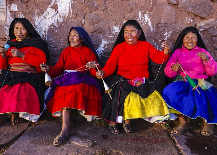 Wool spinning at Lake Titicaca, Peru